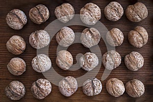 Whole walnut on the table. Texture