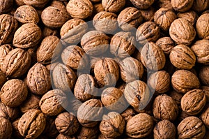 Whole Walnuts background, food concept. Top view