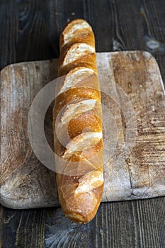 a whole wheat baguette, not cut into pieces