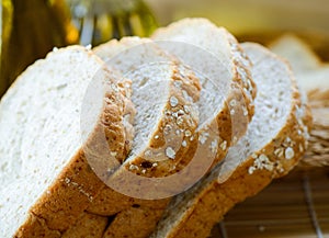 Whole wheat bread slices on table