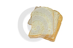 Whole wheat bread stack on isolated white background.