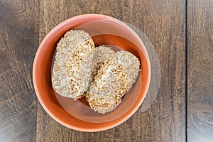 Whole wheat breakfast biscuits in brown bowl
