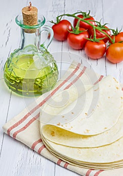 Whole wheat flour tortillas with tomatoes and olive oil