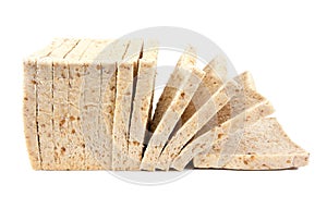 Whole wheat fresh bread slices isolated on white background