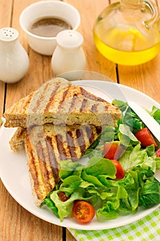 Whole wheat sandwiches stuffed with cheese and parsley