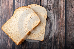 Whole wheats breads on the wooden