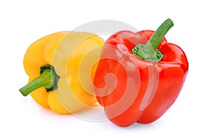 Whole of yellow adn red sweet bell pepper or capsicum isolated photo