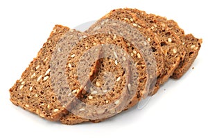 Wholegrain bread slices on white background