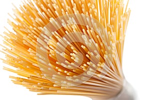 Wholegrain spaghetti pasta isolated on white photo