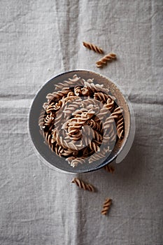 Wholegrain spelt pasta in a ceramic bowl organic pasta