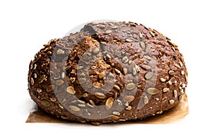 Wholemeal rye bread with sunflower and pumpkin seeds isolated on white