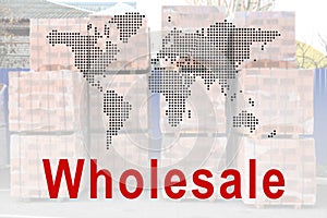 Wholesale business. World map and pallets with bricks on background