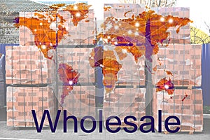 Wholesale business. World map and view of pallets with red bricks on background