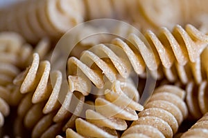 Wholewheat Pasta Twirls Macro photo