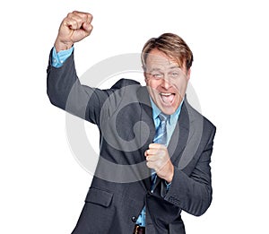 Whoop whoop. Studio portrait of a businessman celebrating a victory with an air punch.