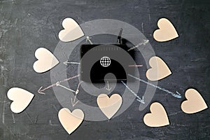 WI-fi Internet or online dating. Global communication, networking and social media. Wi-fi router and hearts