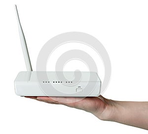 Wi-Fi router with WPS technology on female hand, isolated on white photo