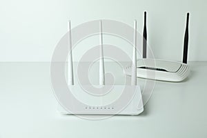 Wi-Fi routers with external antennas on white