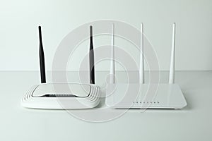 Wi-Fi routers with external antennas on white background