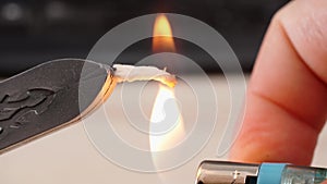 the wick is set on fire to Wax stamp to create a three-dimensional impression.