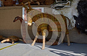 Wicker animal figures. Donkey, snake and turtle. Garden figures.