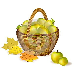 Wicker basket with apples and autumn leaves