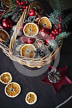 Wicker basket with Christmas decorations