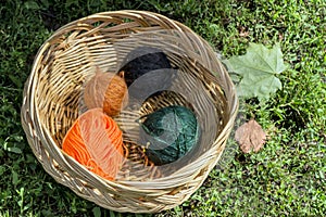 Wicker  basket with colorful yarn