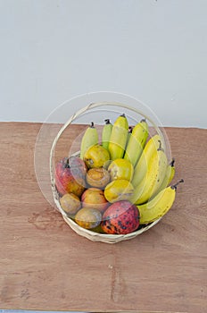 Wicker Basket Filled With Fruits