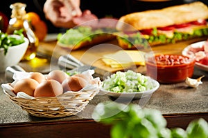 Wicker basket of fresh eggs on a kitchen counter