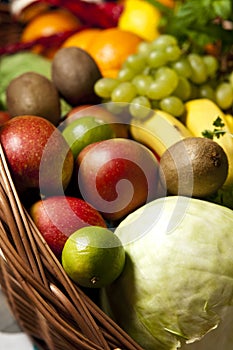 Wicker basket with fruit and vegetables