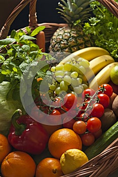 Wicker basket with fruit and vegetables