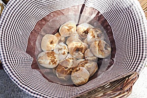 Wicker basket full of breads