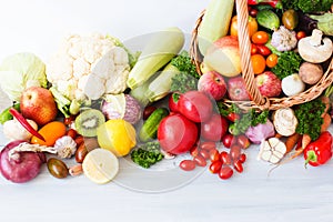 Wicker basket full of organic fruit and vegetables.