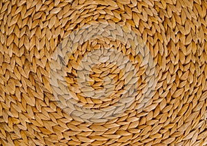 Wicker basket or interior decor close-up. The texture of weaving in a circle