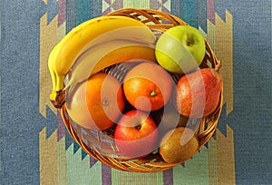 Wicker basket with mixed fruits