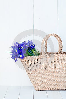 Wicker basket with spring flowers