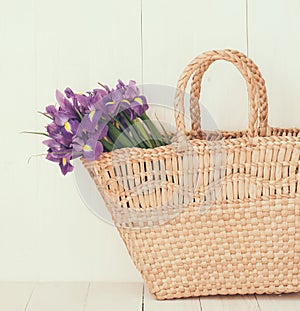 Wicker basket with spring flowers