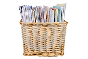 Wicker basket with textbooks and catalogs
