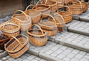 Wicker baskets at the fair, folk crafts on the market