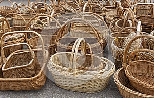 Wicker baskets made of straw. Russian craft and handmade souvenirs