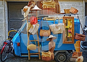 Wicker baskets , women`s hats and bags made of straw