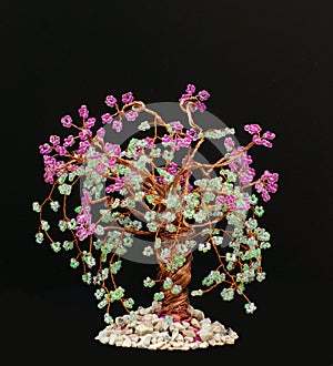 Wicker in beads.blooming sakura.