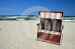 Wicker chair on the beach