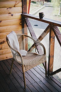 Wicker chair on a cosy balcony