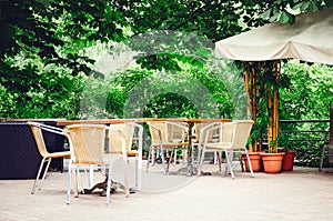 Wicker chairs. Cafe in the street