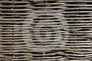 Wicker fence. Abstract background texture. Wattle has long been considered symbol of comfort and measured rural life