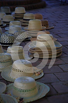 Wicker hats on the paving slabs. Plazuela del Cristo. Trinidad, Cuba