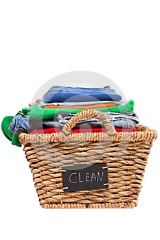 Wicker laundry basket filled with clean clothes