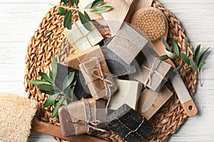 Wicker mat with handmade soap bars, brush